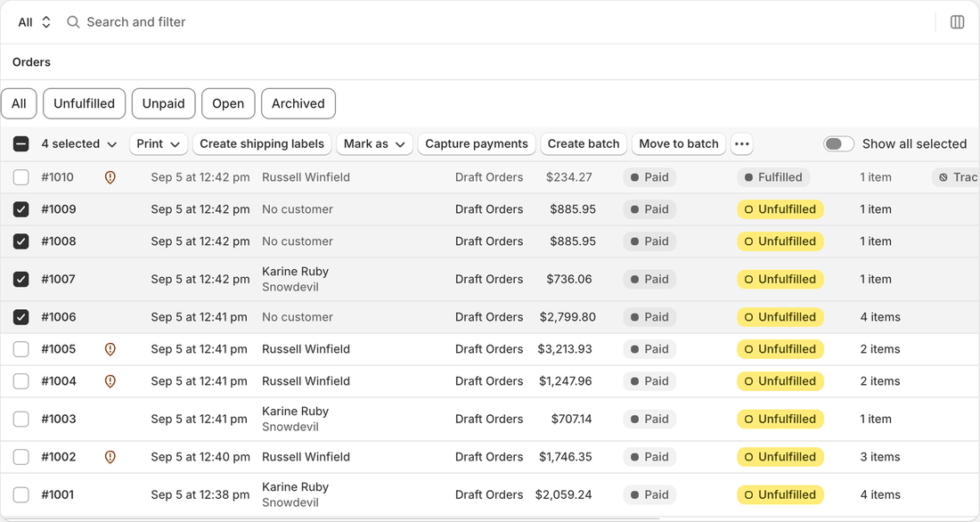 Multiple Shopify order rows selected together by dragging down the list.